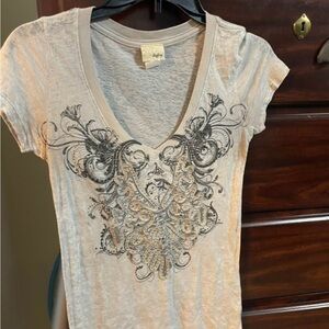 Daytrip Cream V-Neck Tee with Black Design